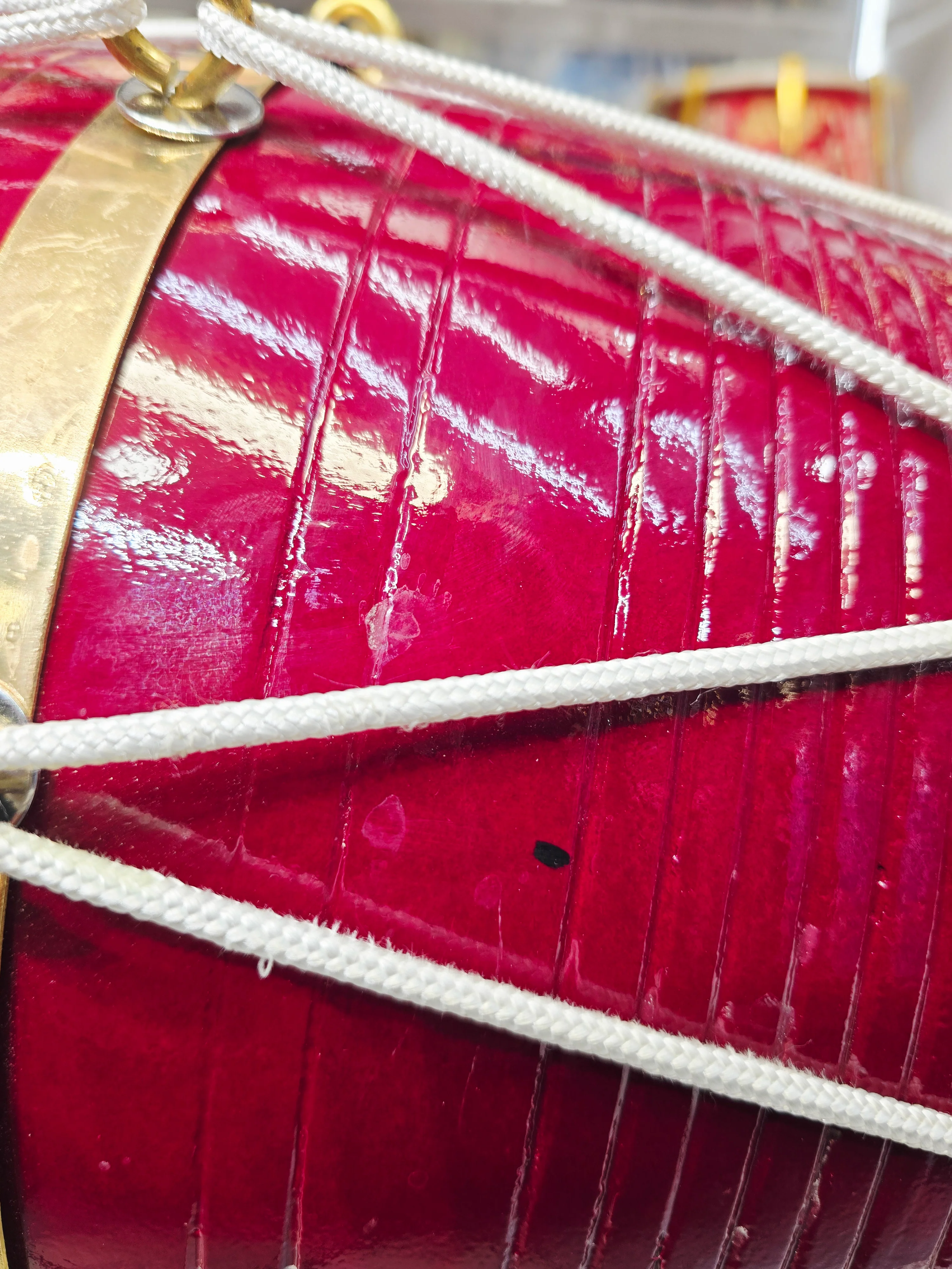 Crimson Relay – West Indian Dholak
23.25″ Length | 17.2 lbs Solid Red Sheesham | *Exceptional Tone *Minor Cosmetic Blemishes - Image 9