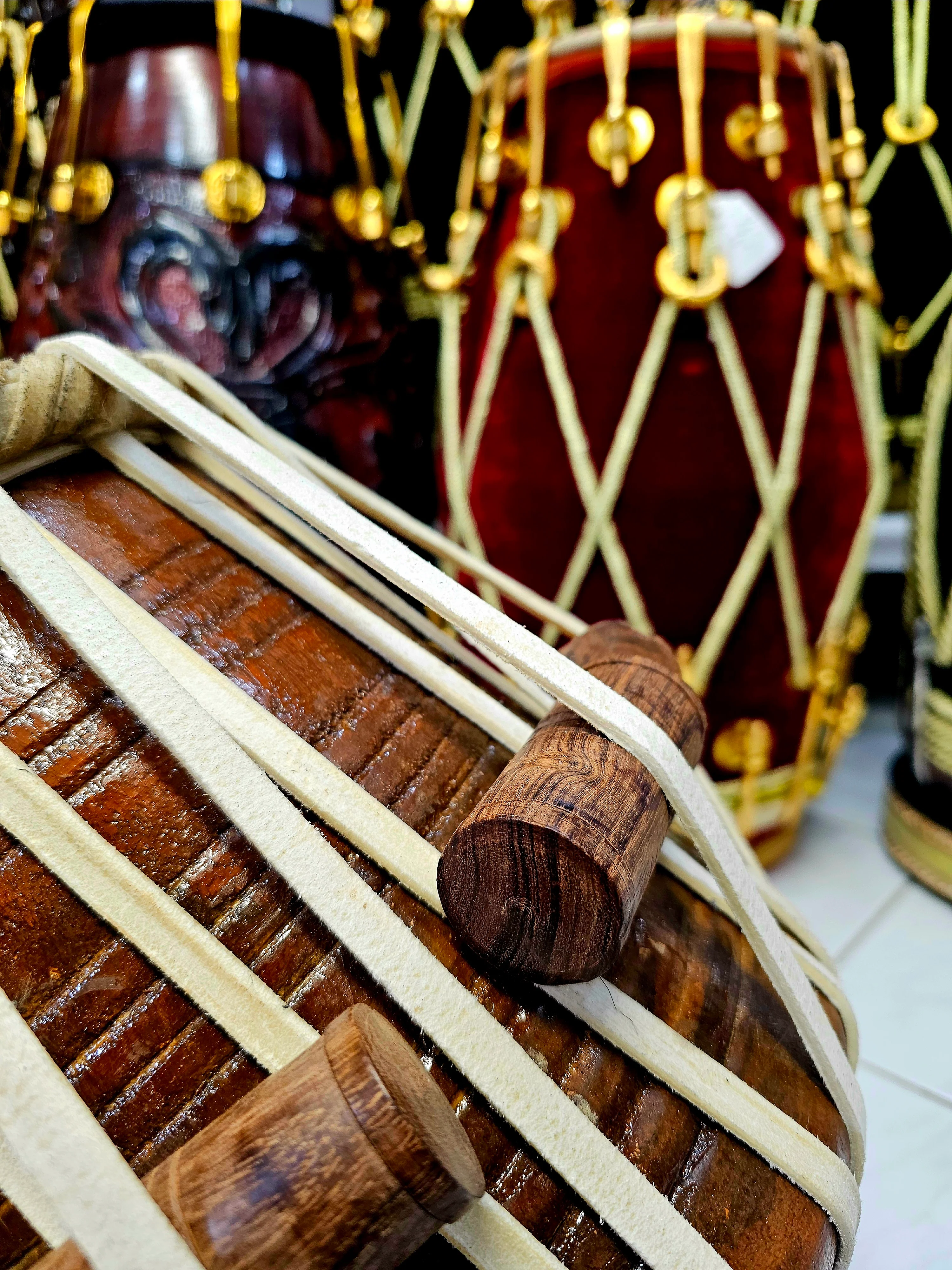 Crimson Resonance: 6" Red Sheesham G/G#/A Dayan with Slight Buzz - Image 5